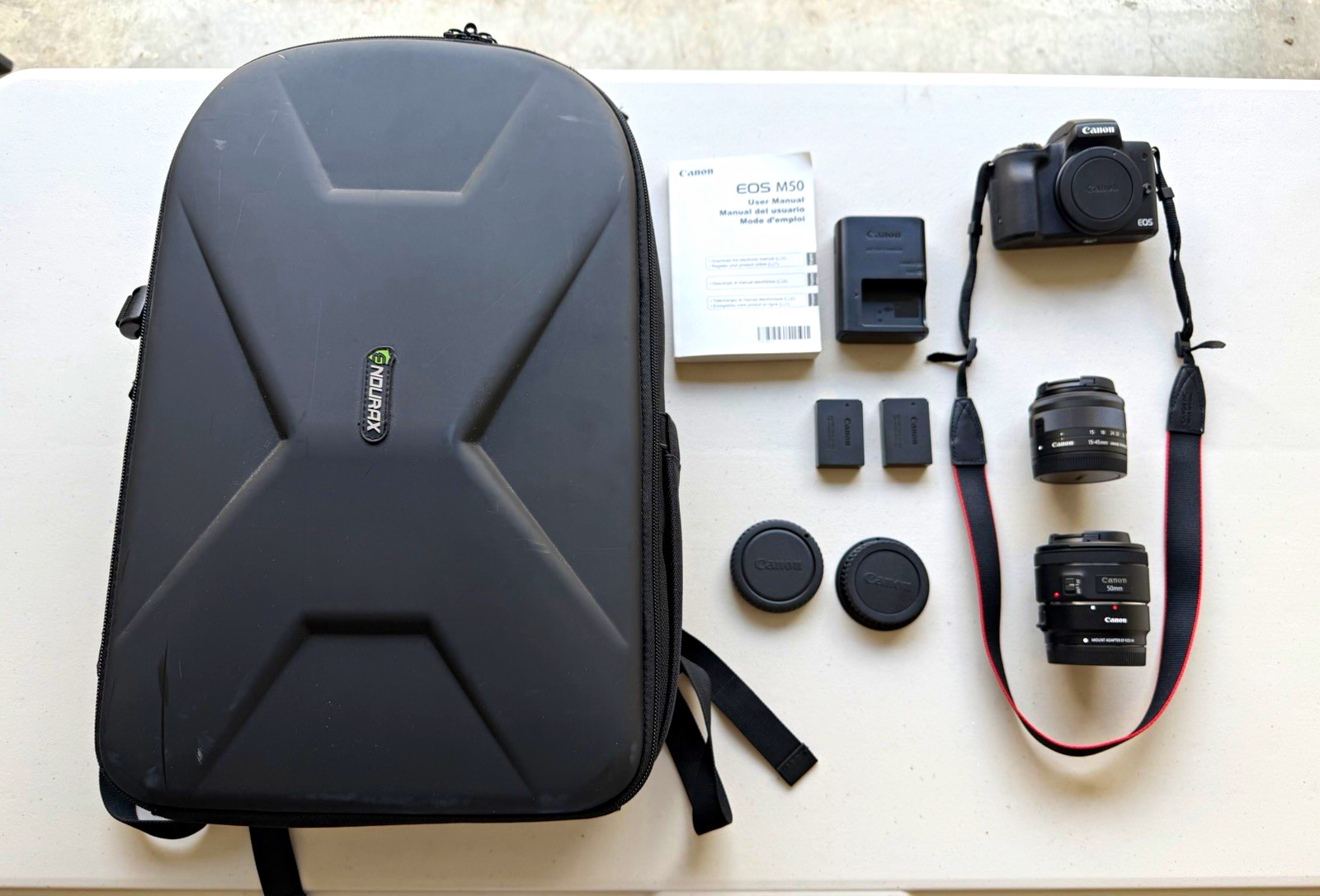 Canon EOS M50 Camera Bundle w/ 2 Lenses, Backpack Case, Charger & 2 Batteries