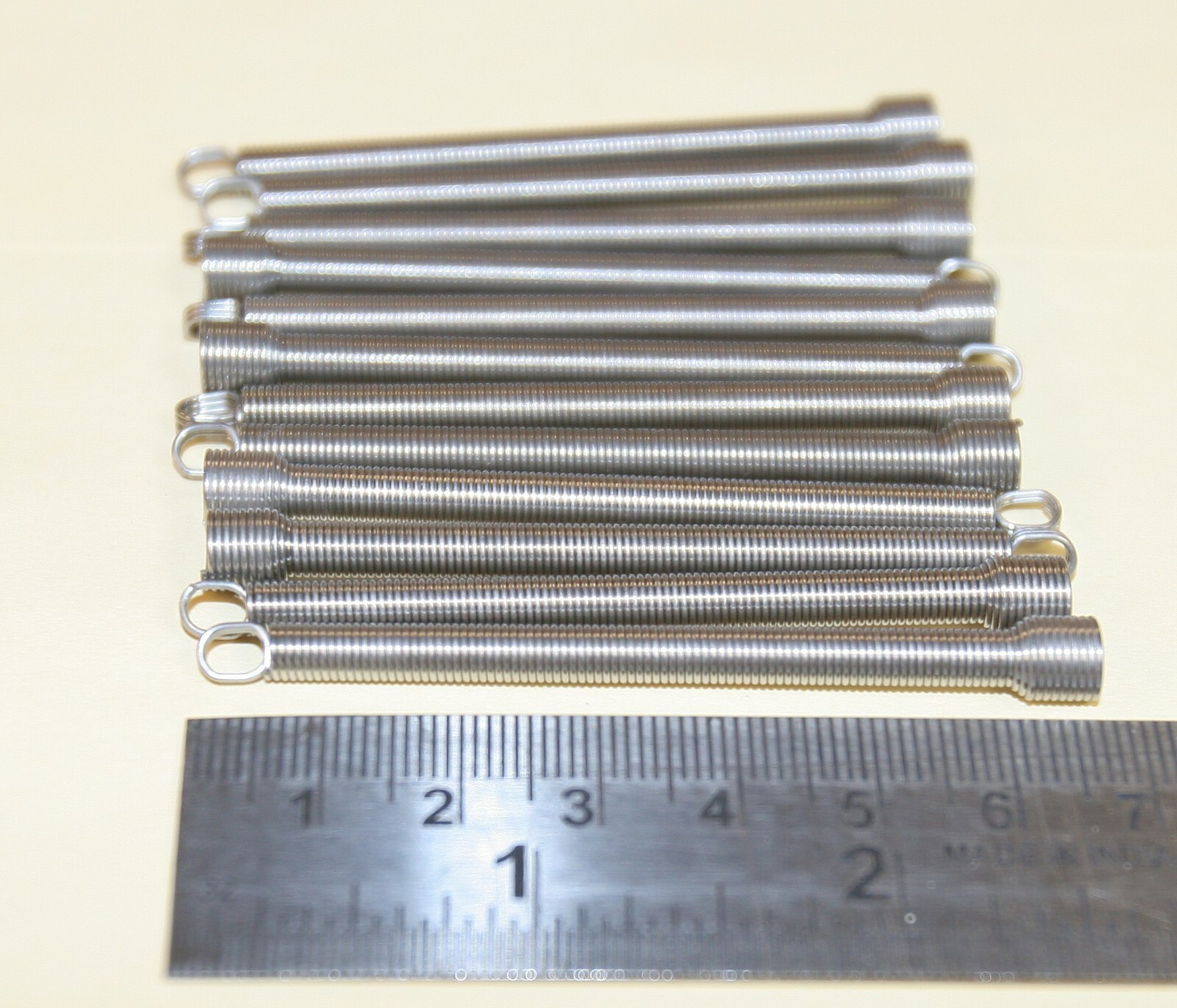 ESD coin chute return spring replacements - 12 pack - part no. 20963