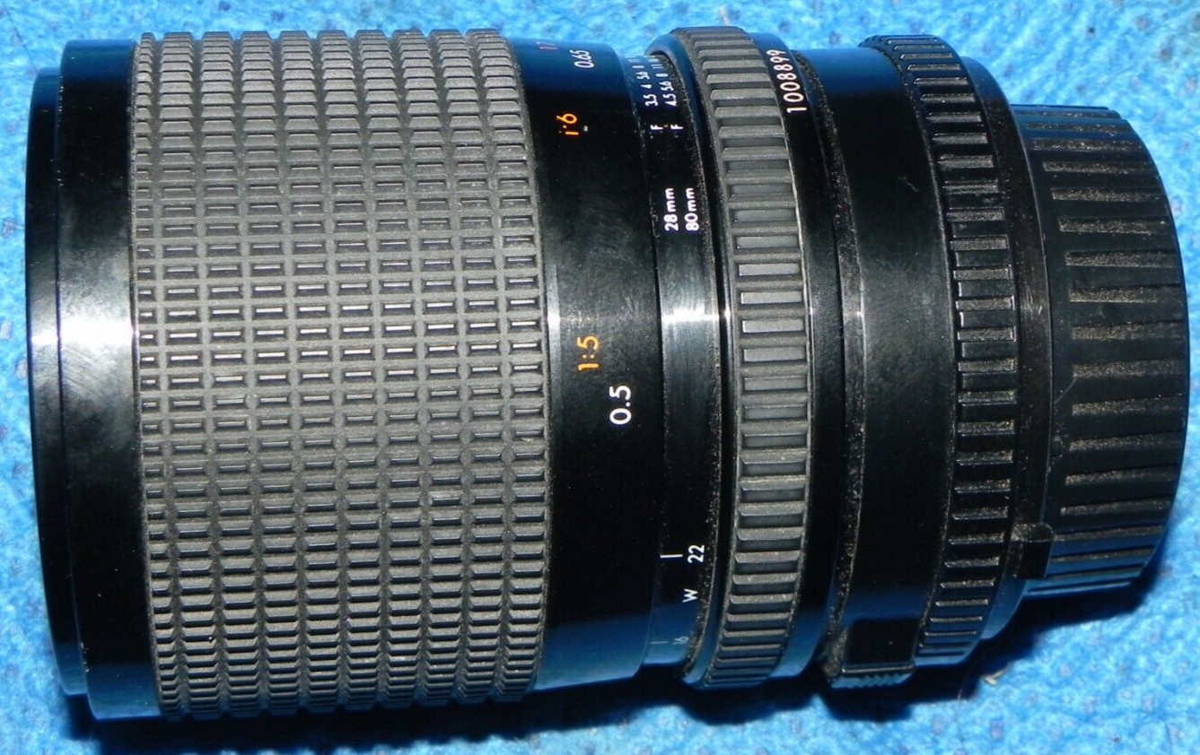 QUANTARAY ZOOM 28-80mm LENS - MOVES AND ADJUSTS VERY EASY / VERY SMOOTH