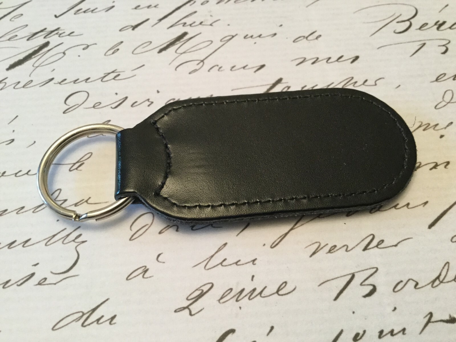 LOTUS Key Ring Etched and infilled On Leather