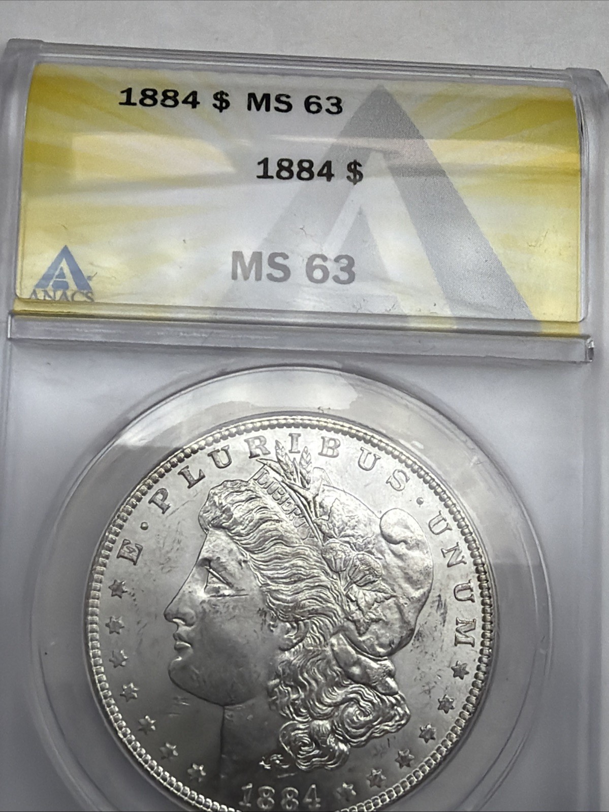 1884 Morgan Silver Dollar ANACS MS63 90% Silver