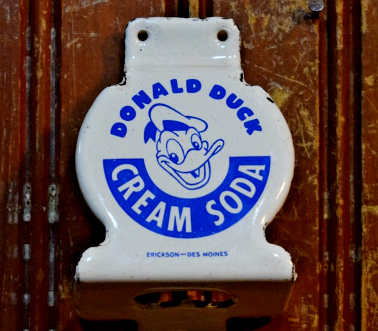 DONALD DUCK CREAM SODA POP BOTTLE OPENER PORCELAIN STAMPED METAL SIGN ERICKSON