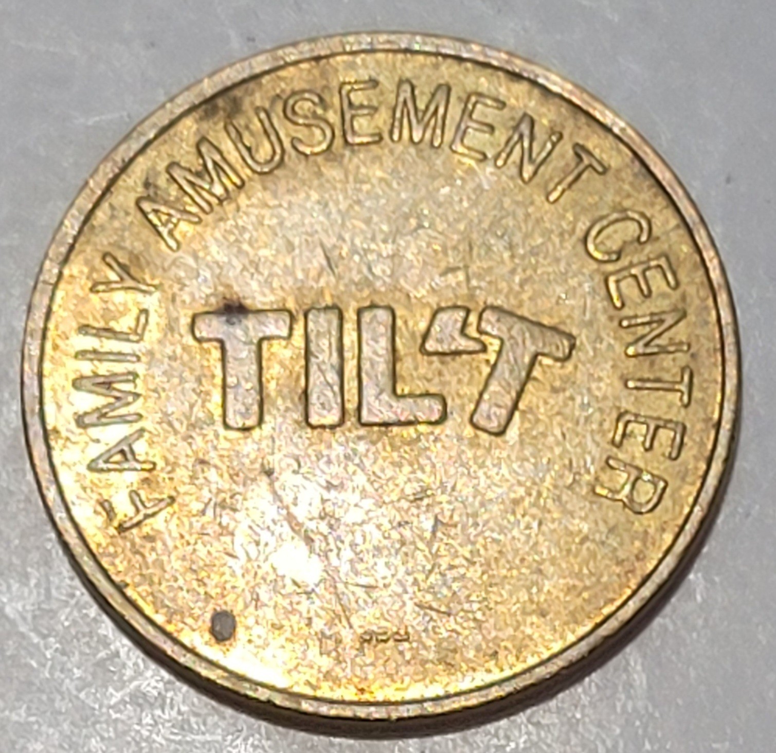 TILT ~ FAMILY AMUSEMENT CENTER TOKEN