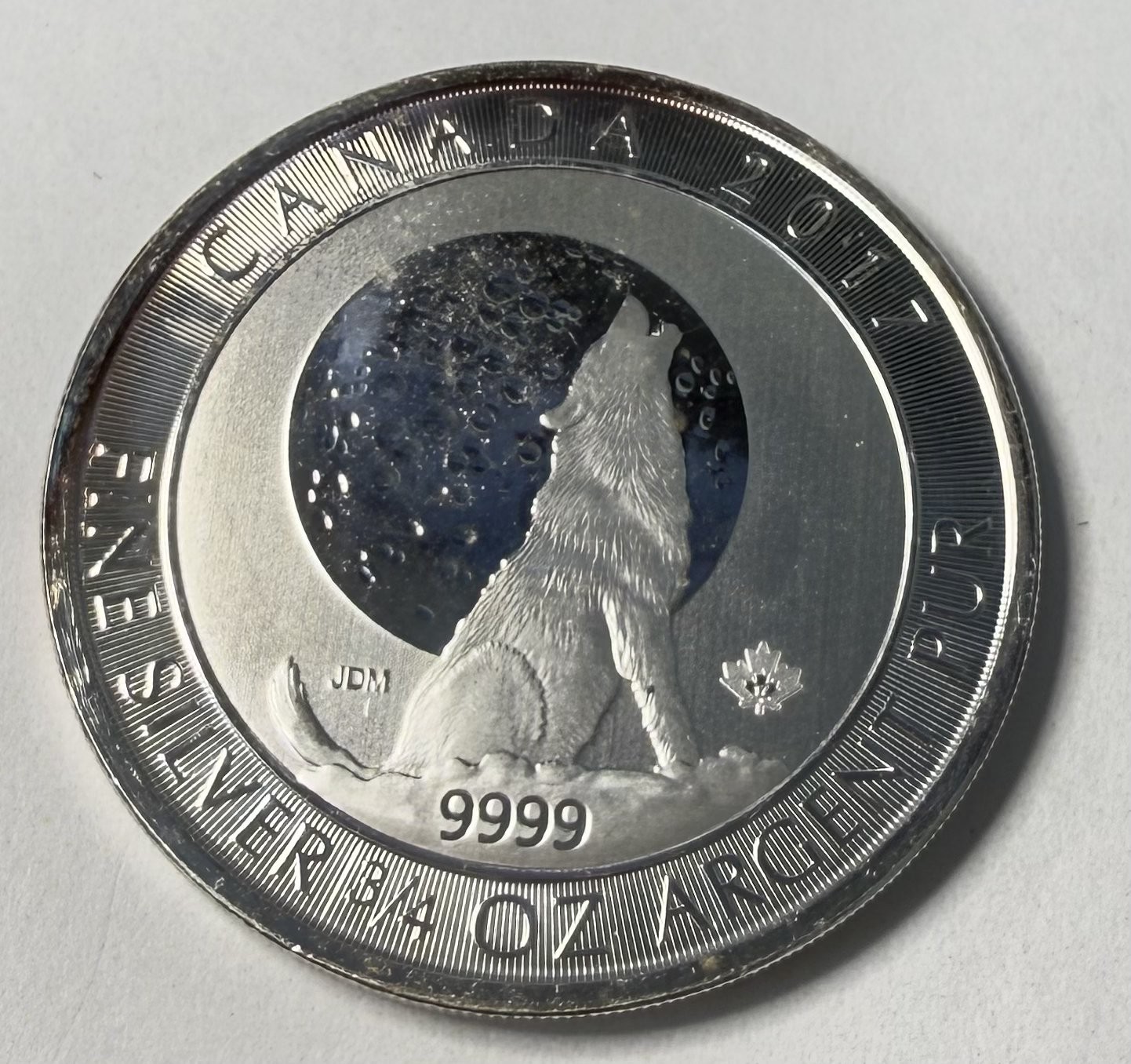 3/4 oz Silver .9999 Round -2017 Canada Howling Wolf Moon - Light Rim Toning
