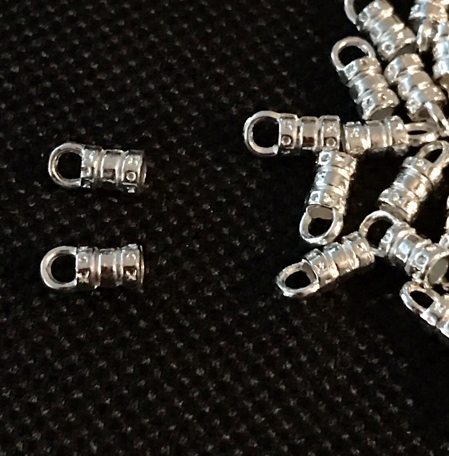 2.5mm Crimp Leather Cord Ends With Loop (90) 2mm hole.