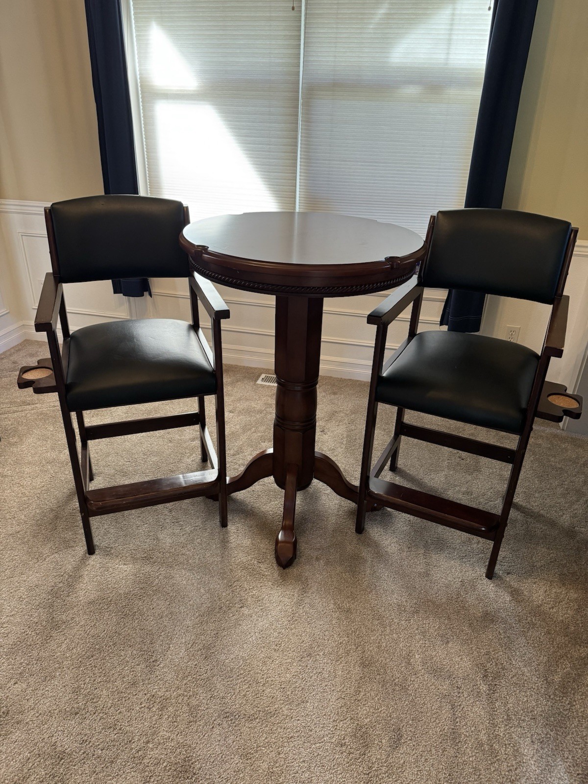 Pub table with kind of leather stools from Costco.