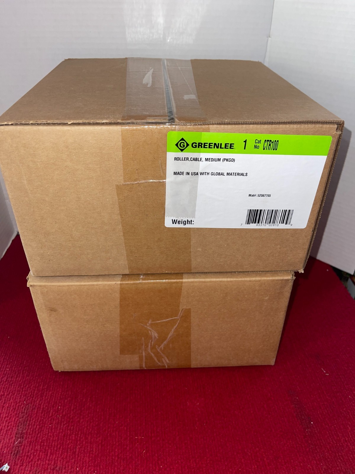 A pair of Greenlee CTR100 Medium Duty Cable Roller  electrical electrician