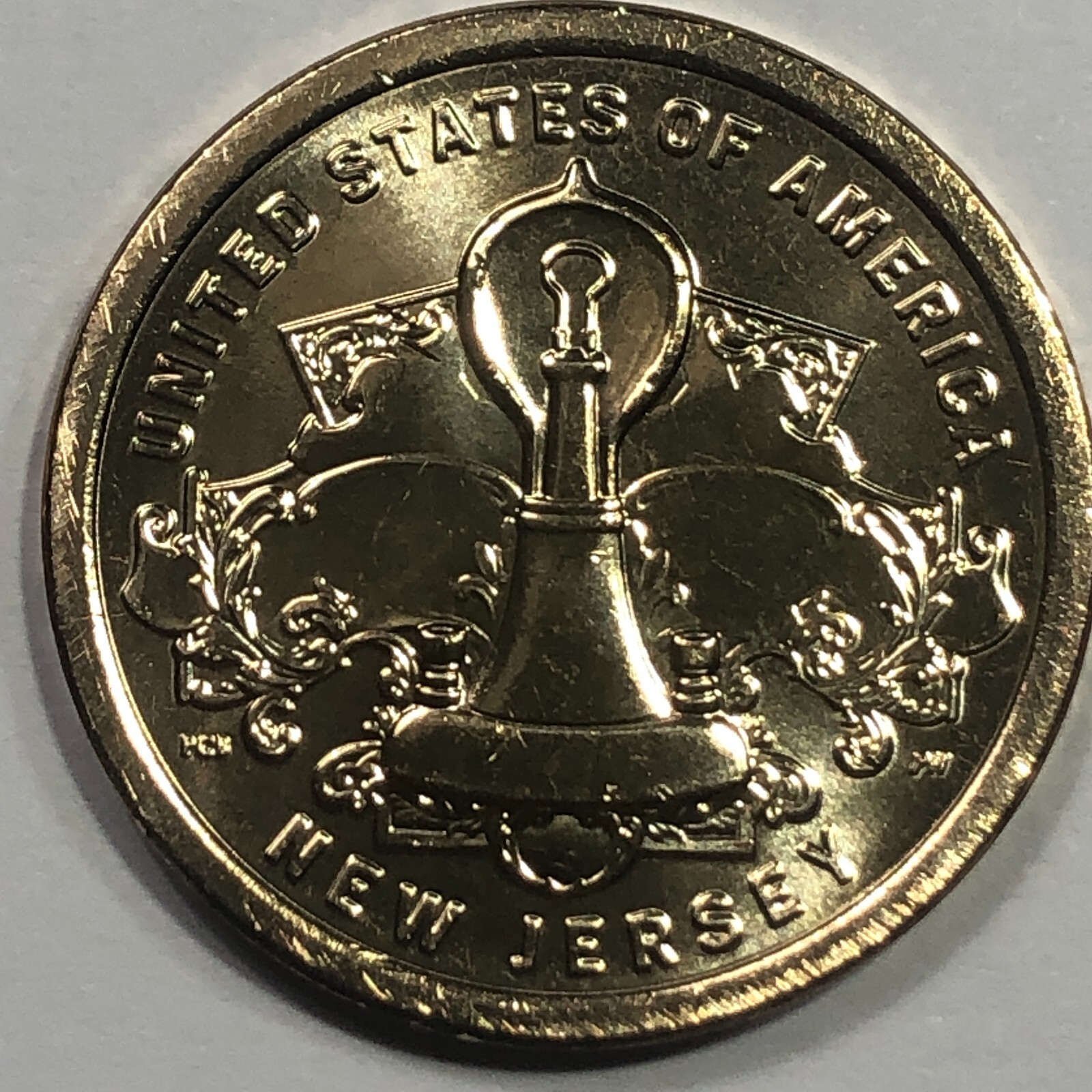 2019-P  New Jersey - American Innovation Golden Dollar Coin
