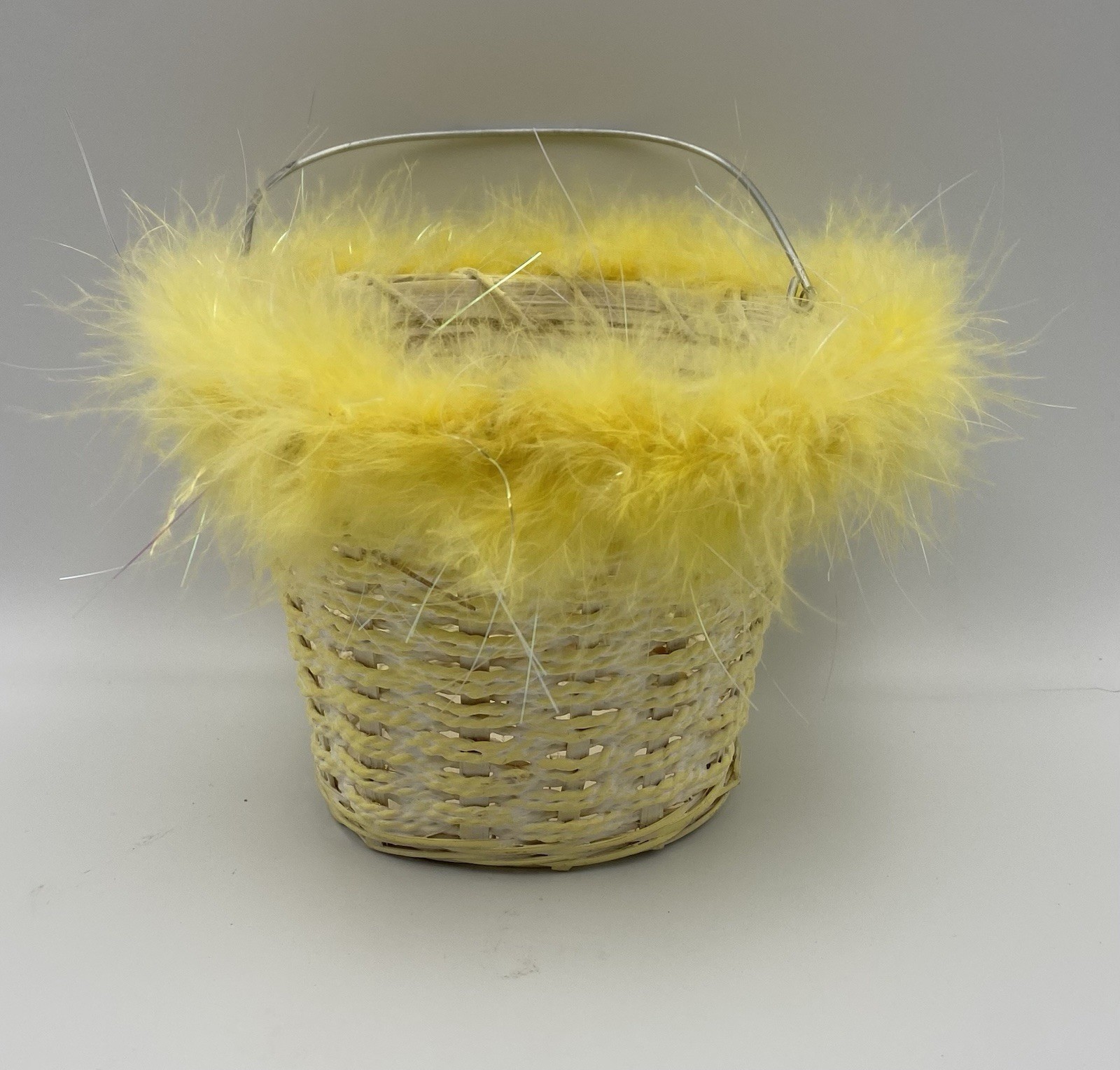Woven Wicker Yellow Easter Basket With Fluffy Yellow Feather Trim Wire Handle