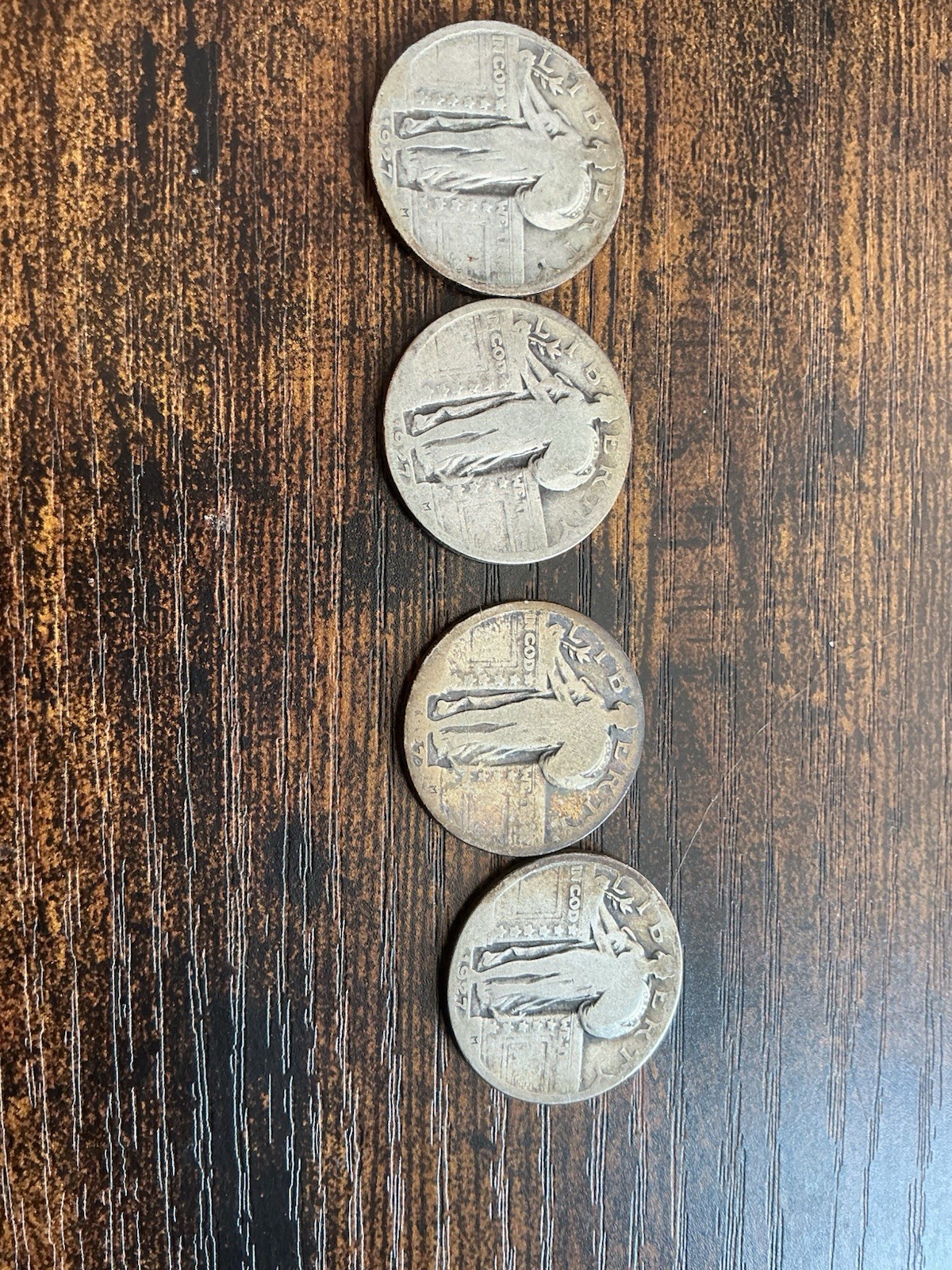 (4) 1927 Liberty Standing Quarters