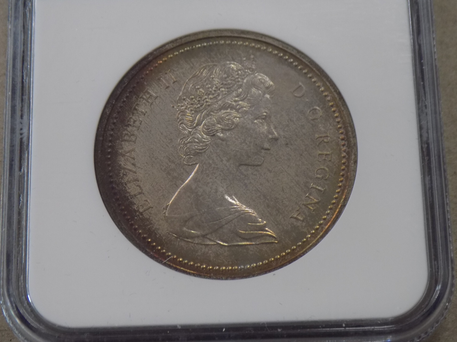 1972 $1 Canada Silver Dollar NGC SP66 Rainbow Toning