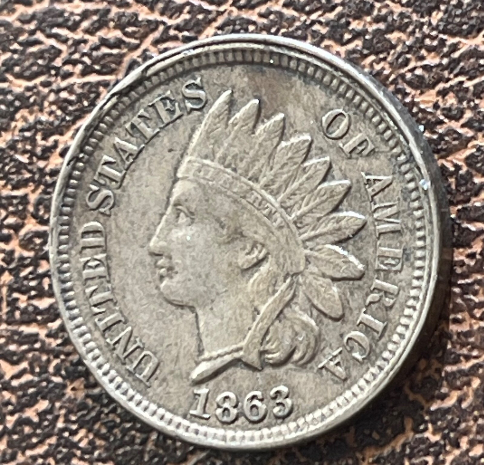1863  Indian head cent ,  XF w/ cud @ k-11