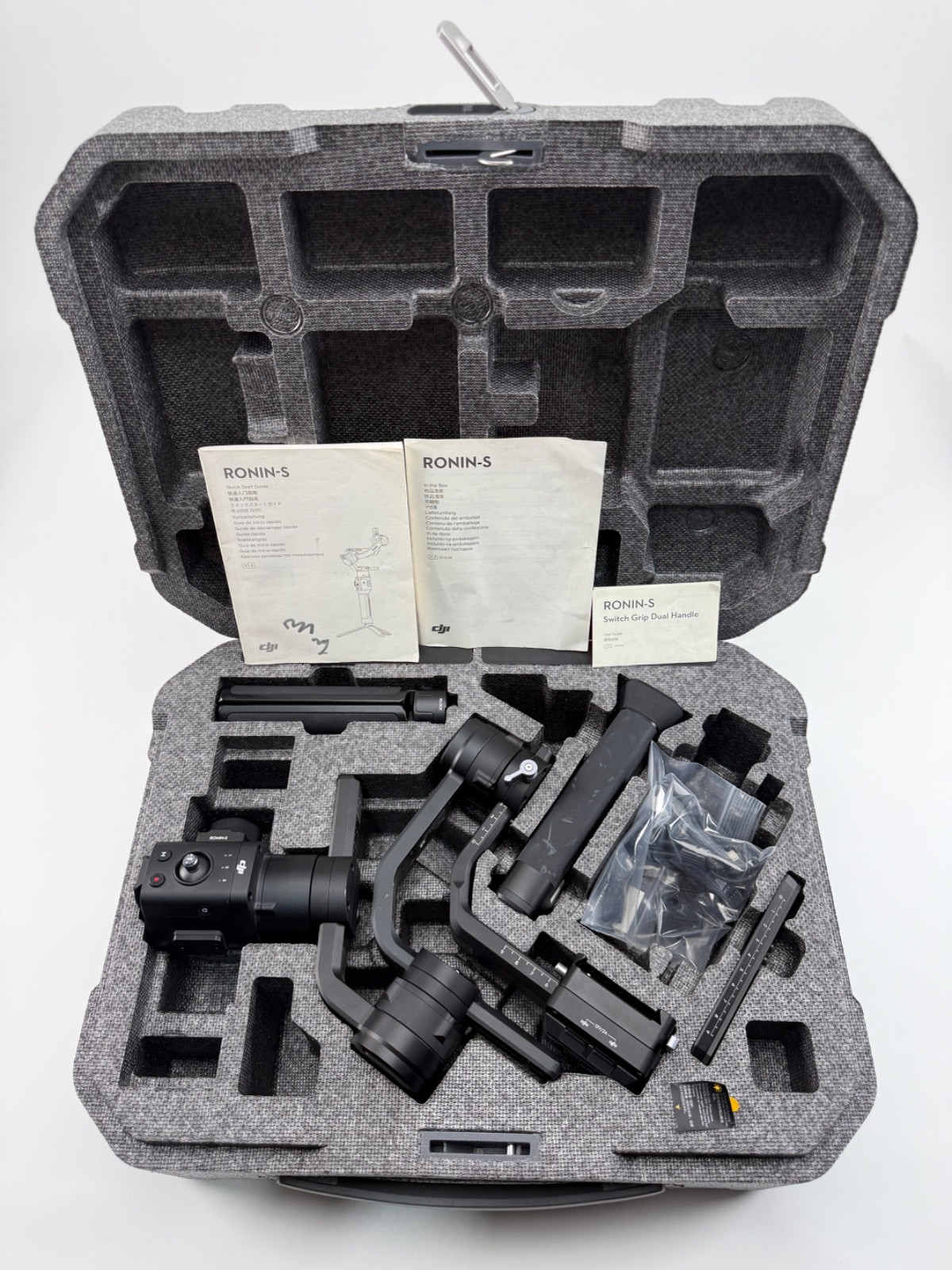 used DJI Ronin-S w/ extra battery grip (new/unopened) & extra accessories - $155
