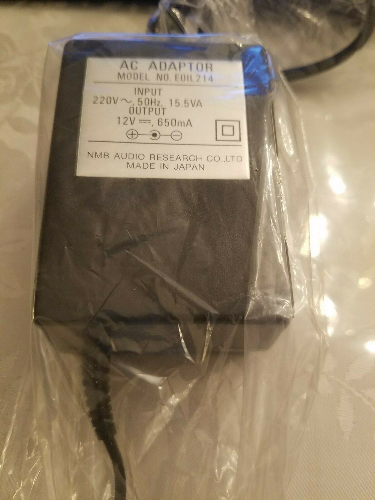 AC  ADAPTOR   MODEL NO. EOIL 214