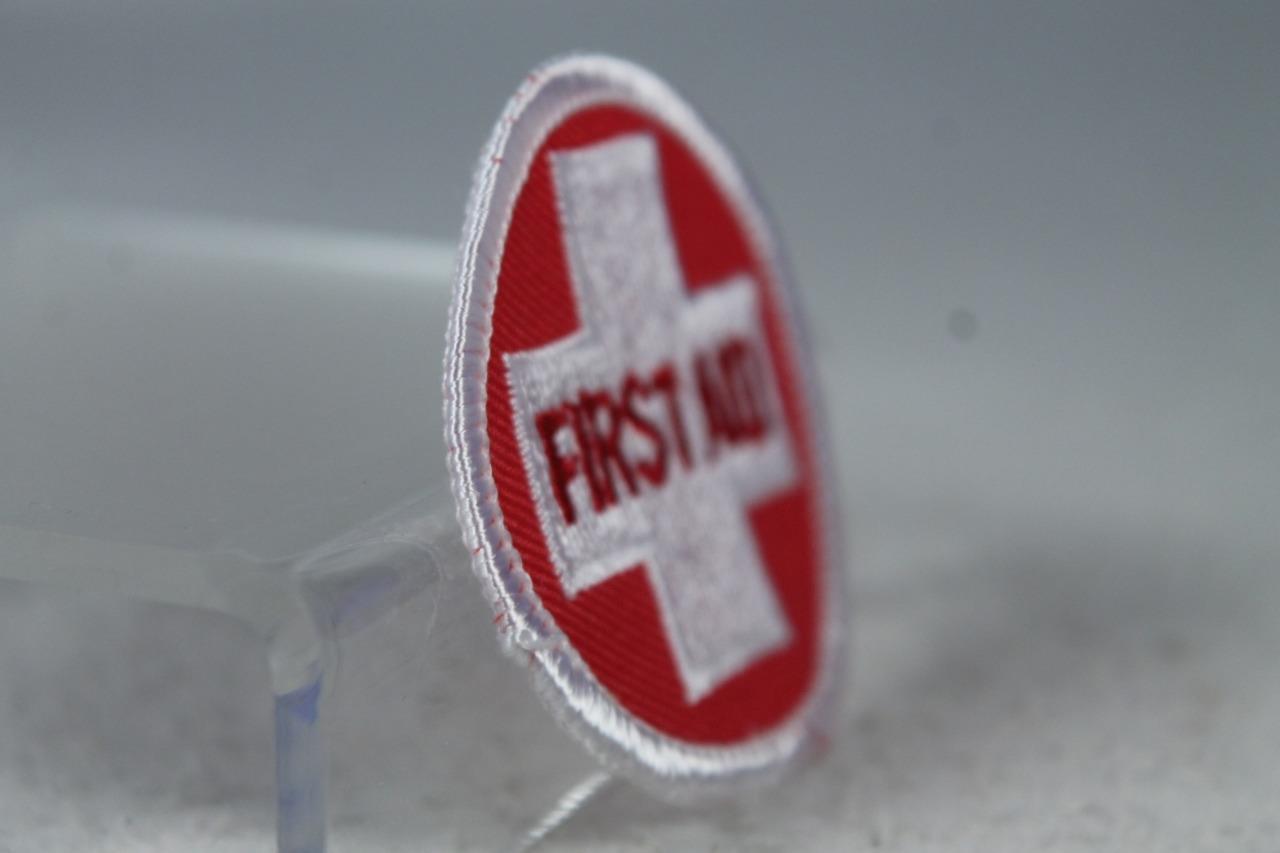 'First Aid' Round Red With White Embroidered Sew On Patch NEW