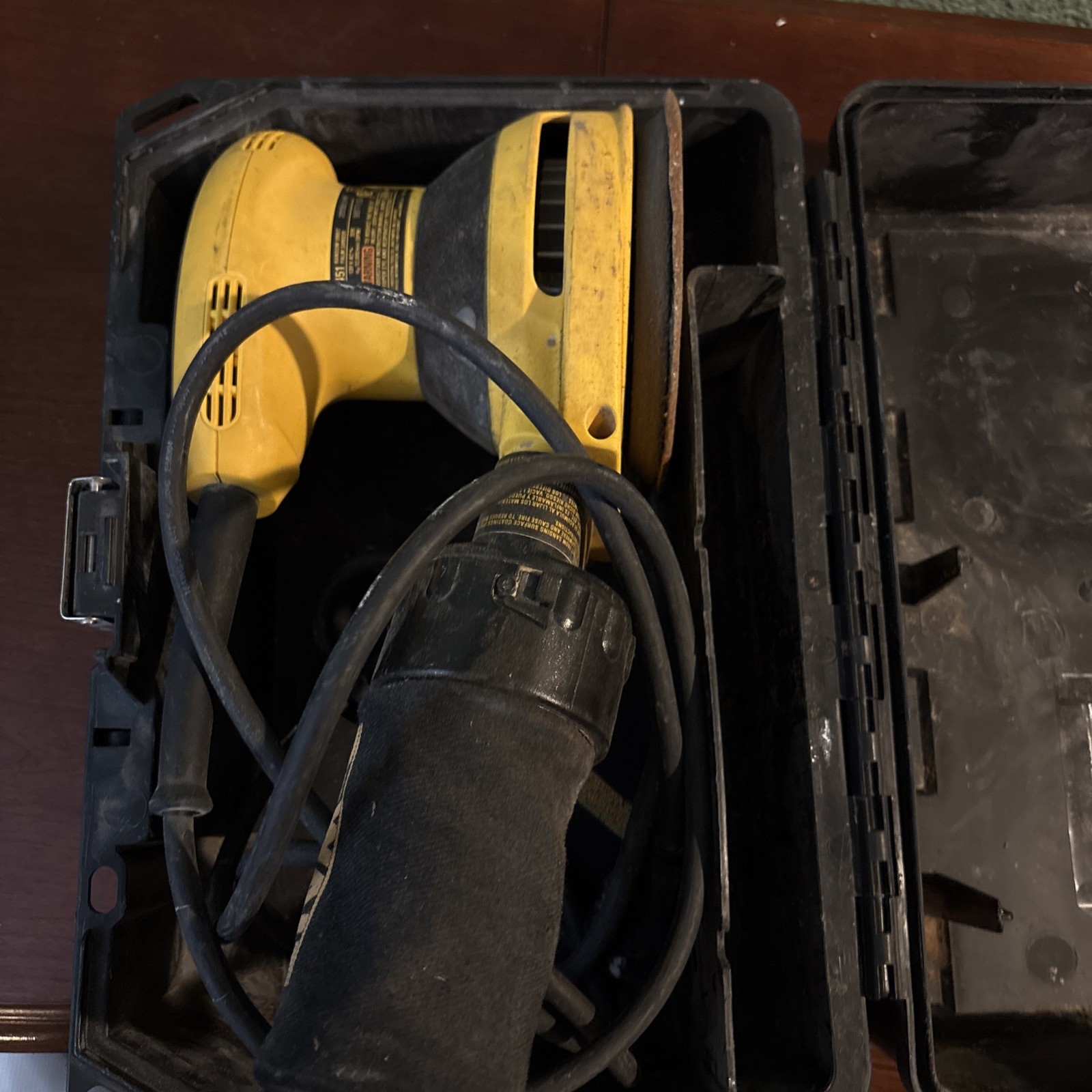 Dewalt Orbital Sander in a hard case.