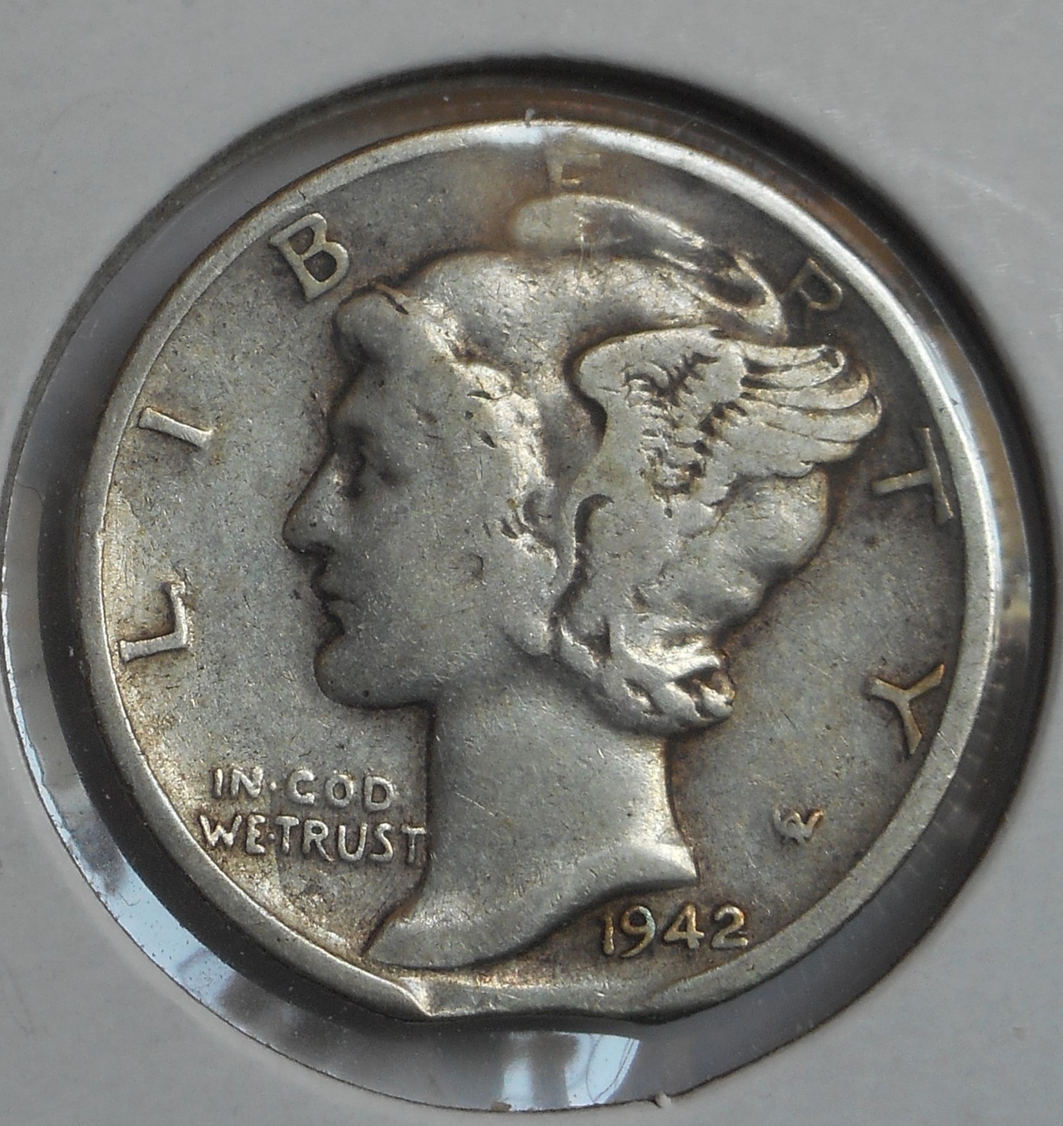 1942 . Mercury Dime . . Clip at 6:00