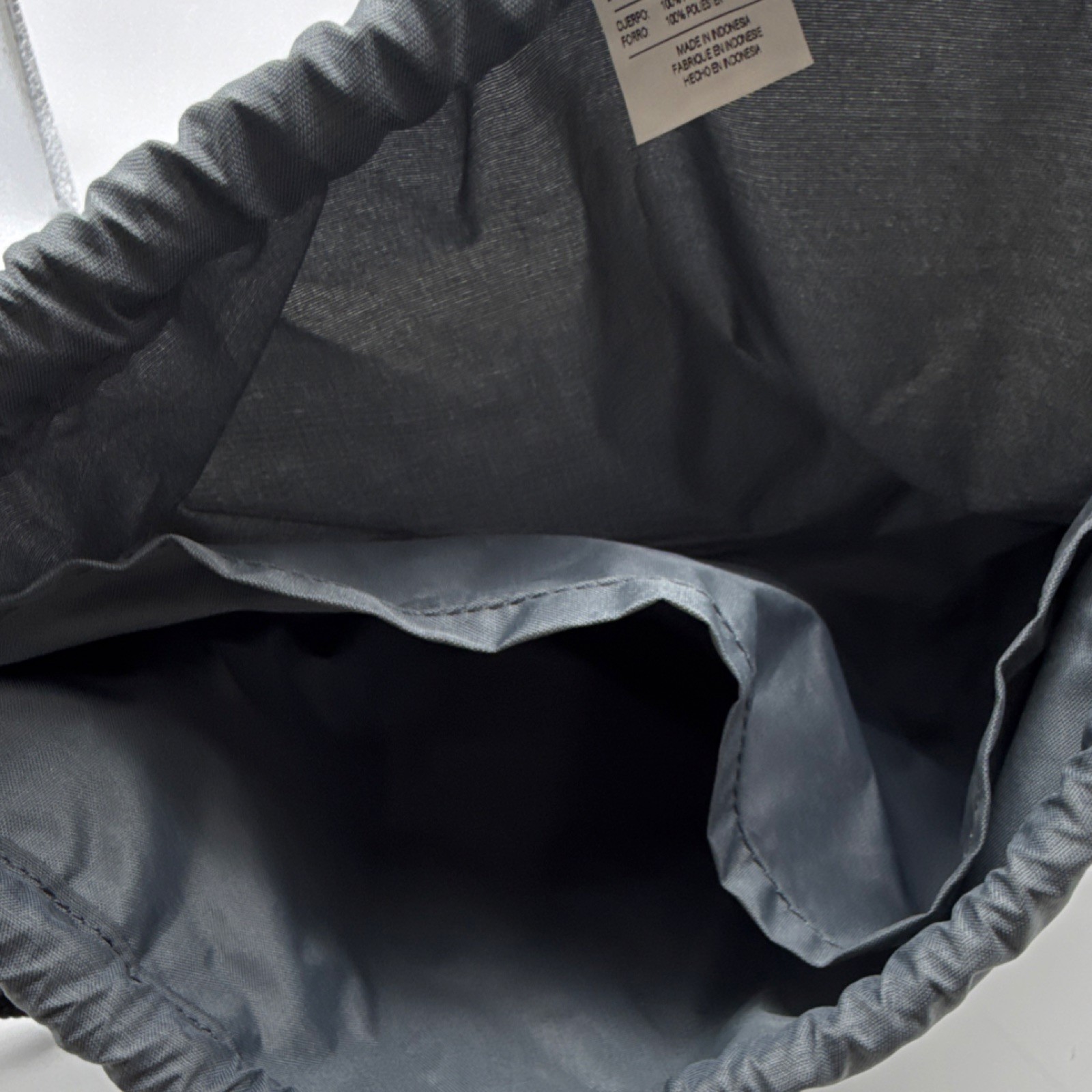 Nike Raiders Drawstring Gym Bag Gray Black Polyester Adjustable Strap Zip Pocket