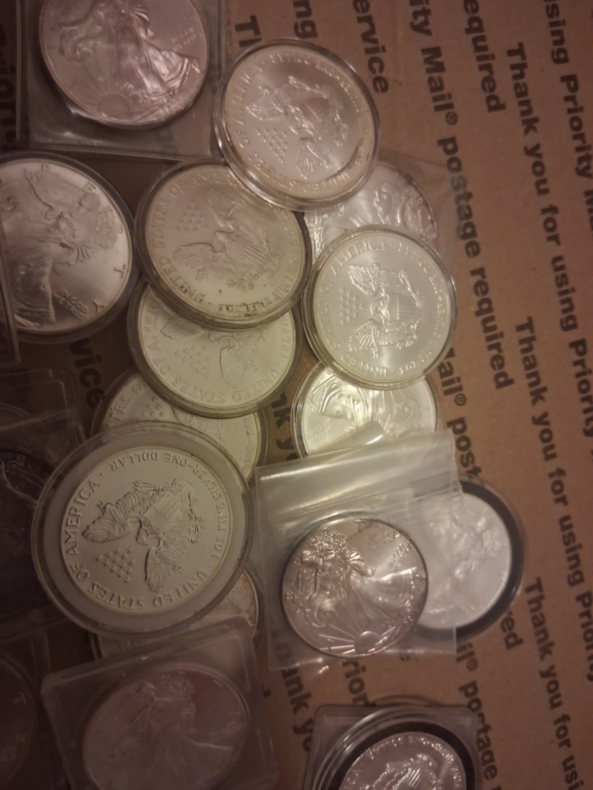 23 US Silver Eagles-- .999 Silver-some toned--see photos