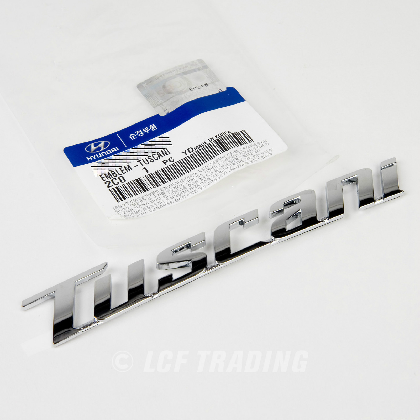 Genuine 2003-06 Tuscani Tiburon ELISA 2.7 Emblem set - NO ALIGNMENT TABS