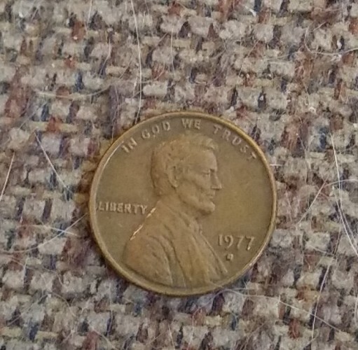 1977 D Lincoln Penny, Filled in small mint mark And L on rim. $150.