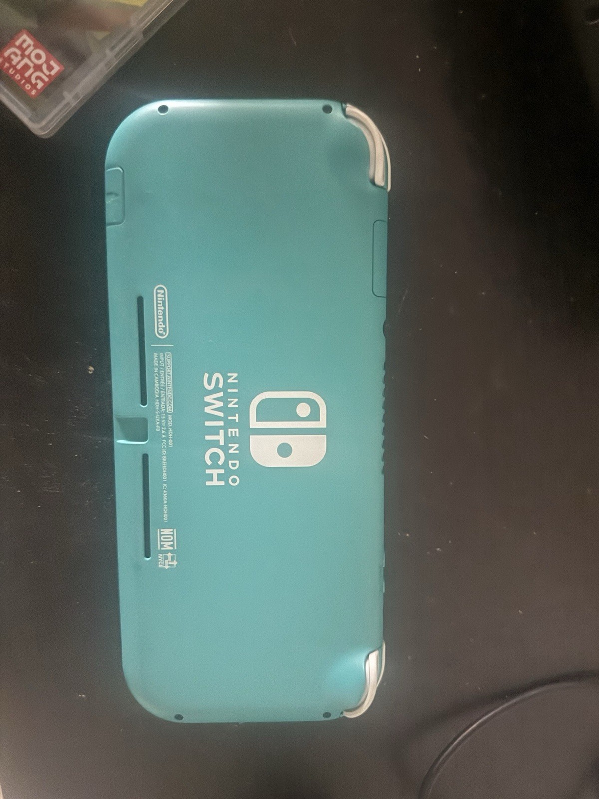 Nintendo Switch Lite Turquoise Bundle w/ Case, Adapter Minecraft & Mario Odyssey