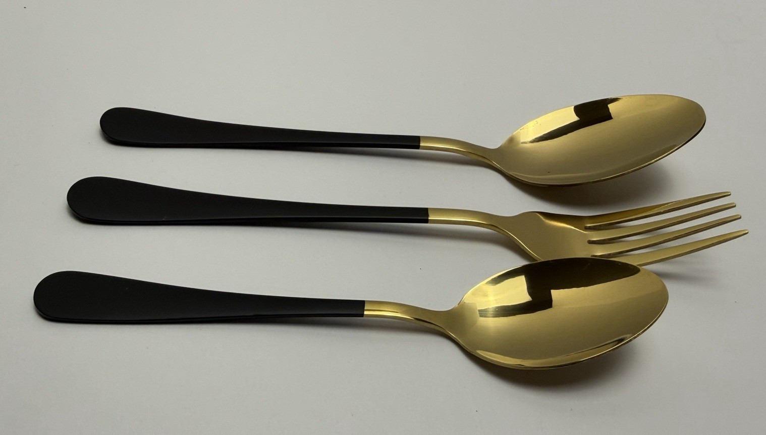 Unbranded 38 Pc Flatware set Gold Matte Black Forks, Big Spoon, Spoon (2) knives