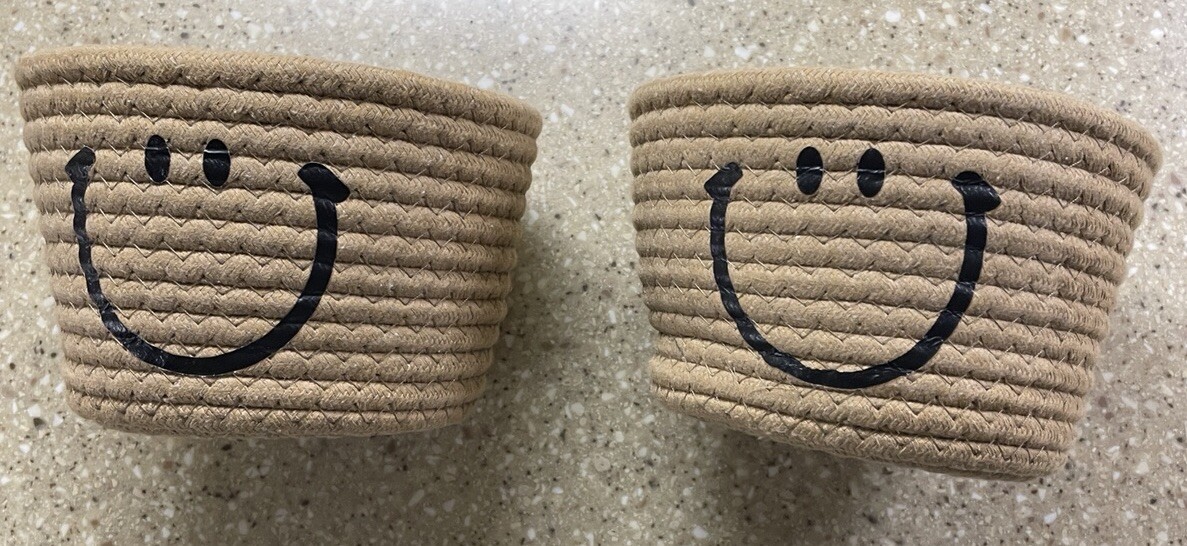 Two Baskets Tan Woven W/ Smiley Face 4” Tall 6.5” Diameter