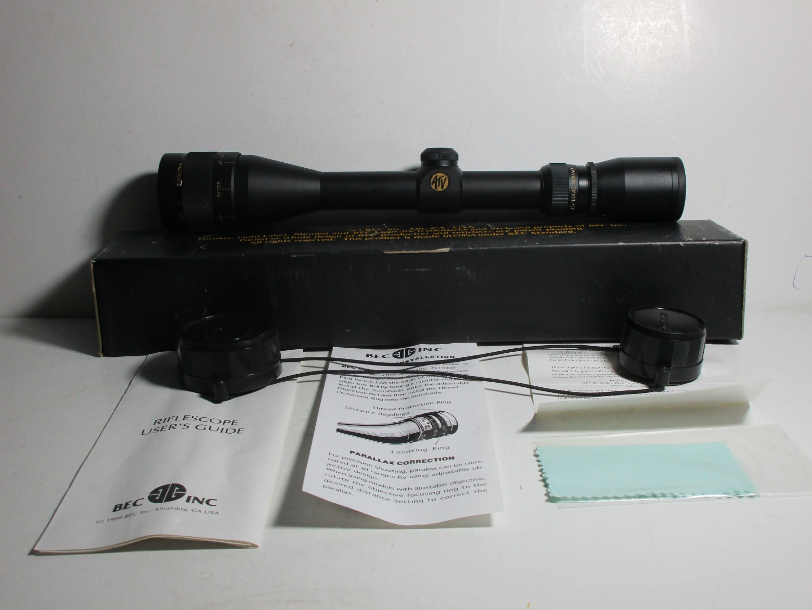 SIMMONS ATV 4.5-14X40 RIFLE SCOPE, WITH SIMMONS LENS PROTECTORS, & PAPERS
