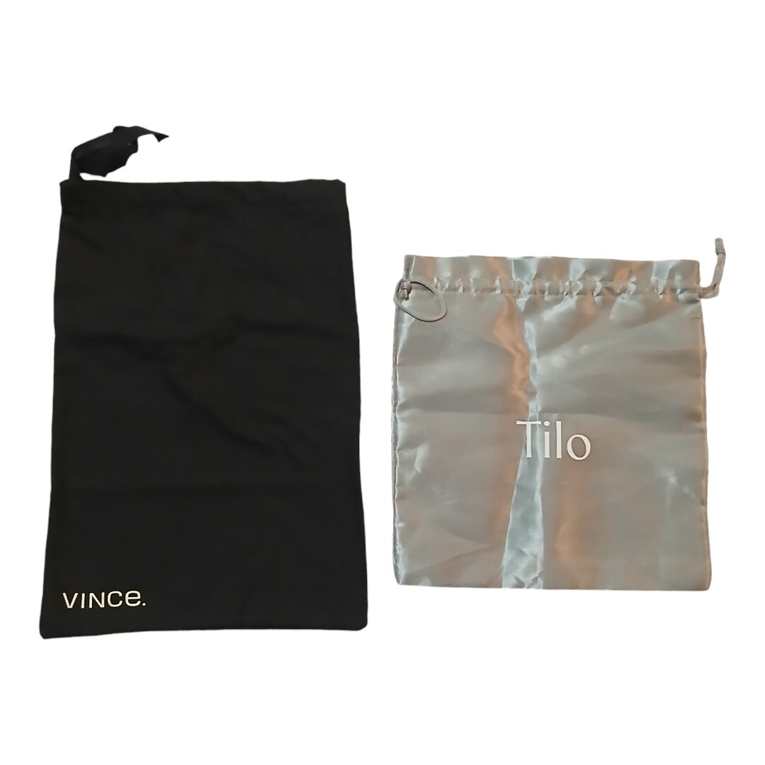 Vince black and Tilo silver dust bags