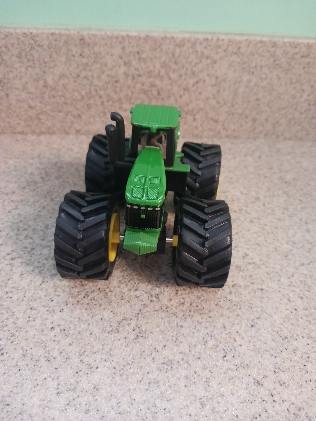 Ertl John Deere Plastic Tractor in picture John Deere licensed