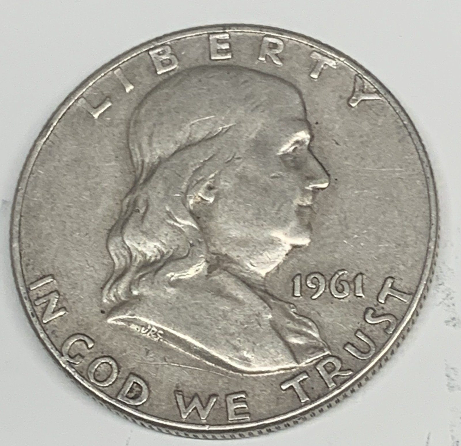 # C8502      FRANKLIN  HALF DOLLAR  COIN,   1961-D