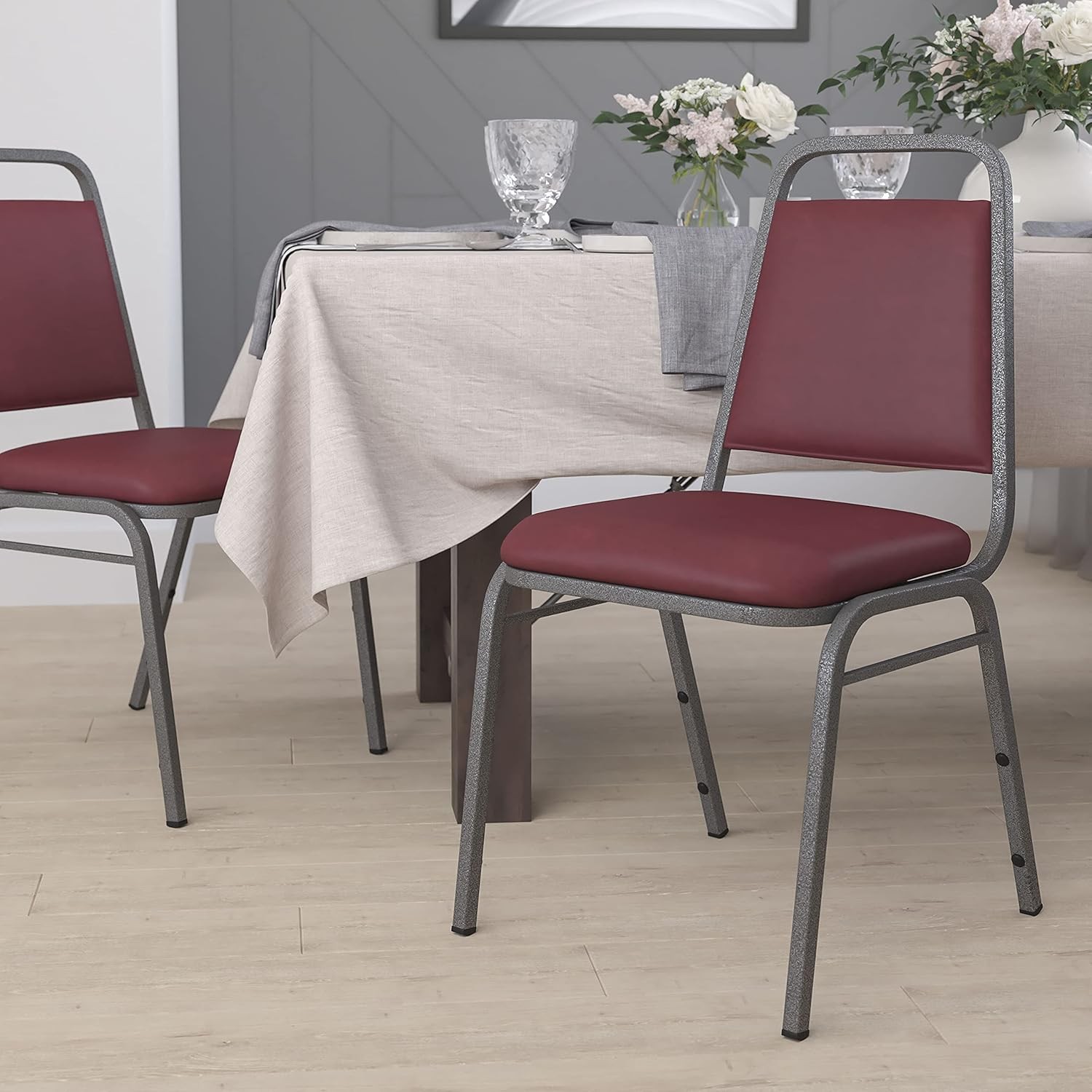 HERCULES Series Trapezoidal Back Stacking Banquet Chair in Burgundy Vinyl Silver