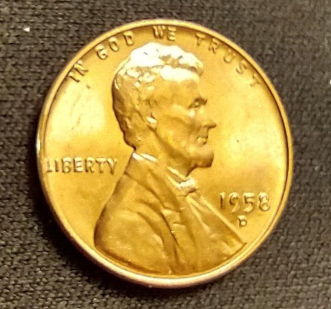 1958 D Lincoln Wheat Cent L on the rim, the "I" has a drip at top obverse.