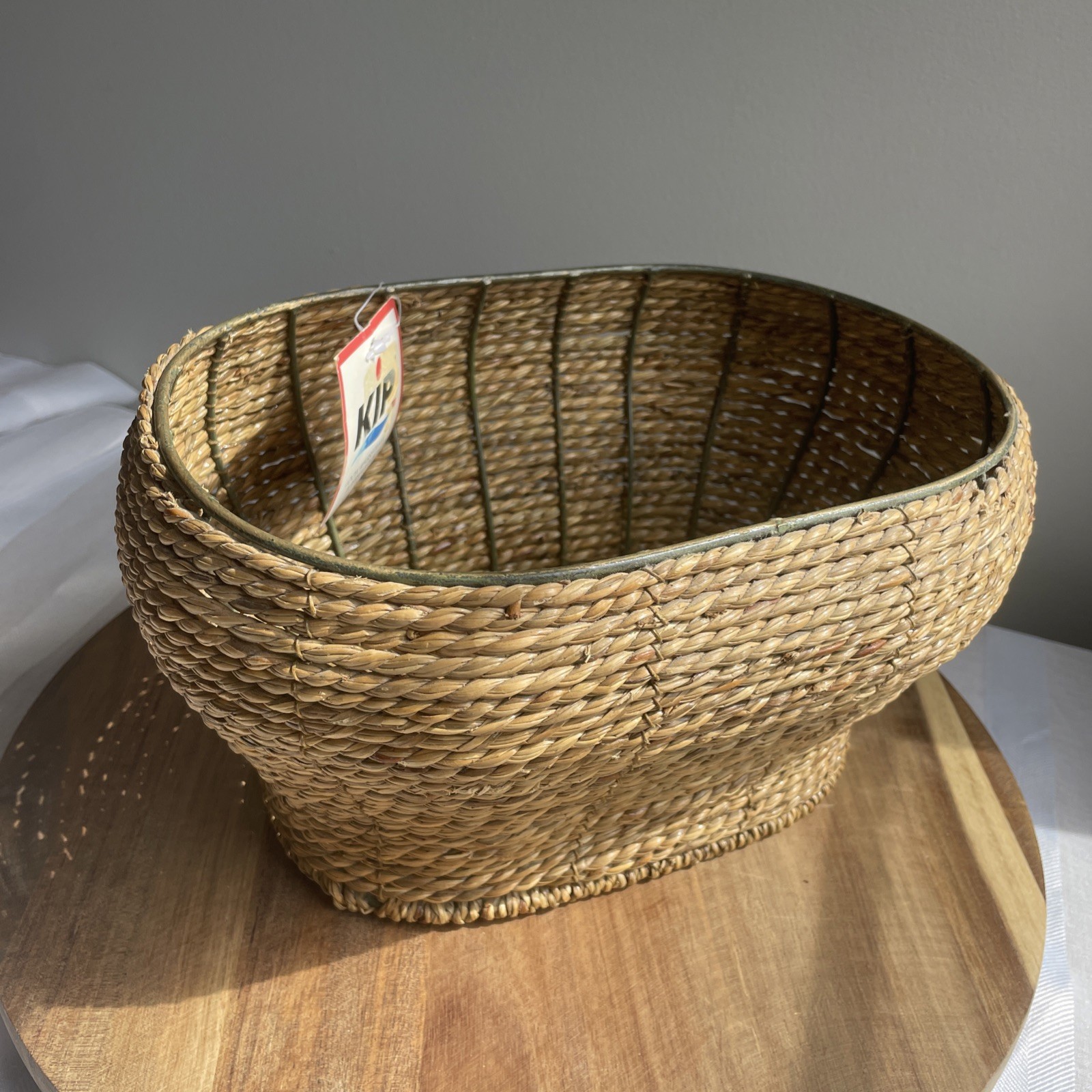 Vintage Handwoven Coiled Rye Straw Rattan Wicker Basket with Iron Leaf and Frame