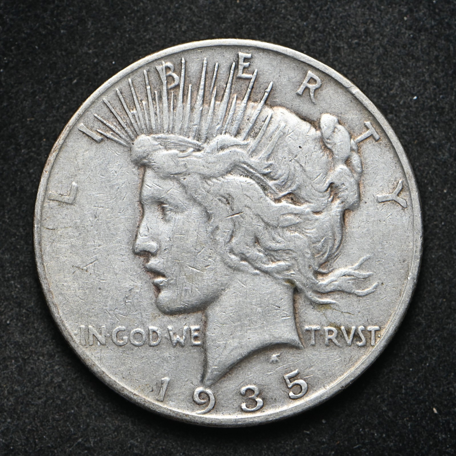 1935-S Peace Silver Dollar VF+ (cn17335)