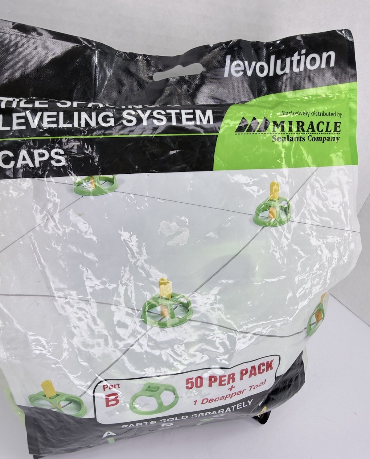 Levolution Tile spacing and Leveling System Caps Part B 50 Pc Bag + Tool