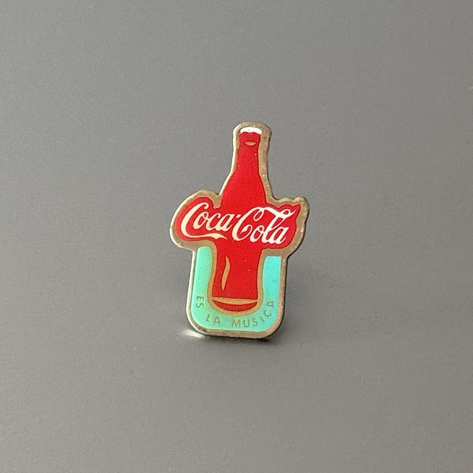 Vintage Coca-Cola Es La Musica Gold Tone Metal Blue And Red Enamel Lapel Hat Pin