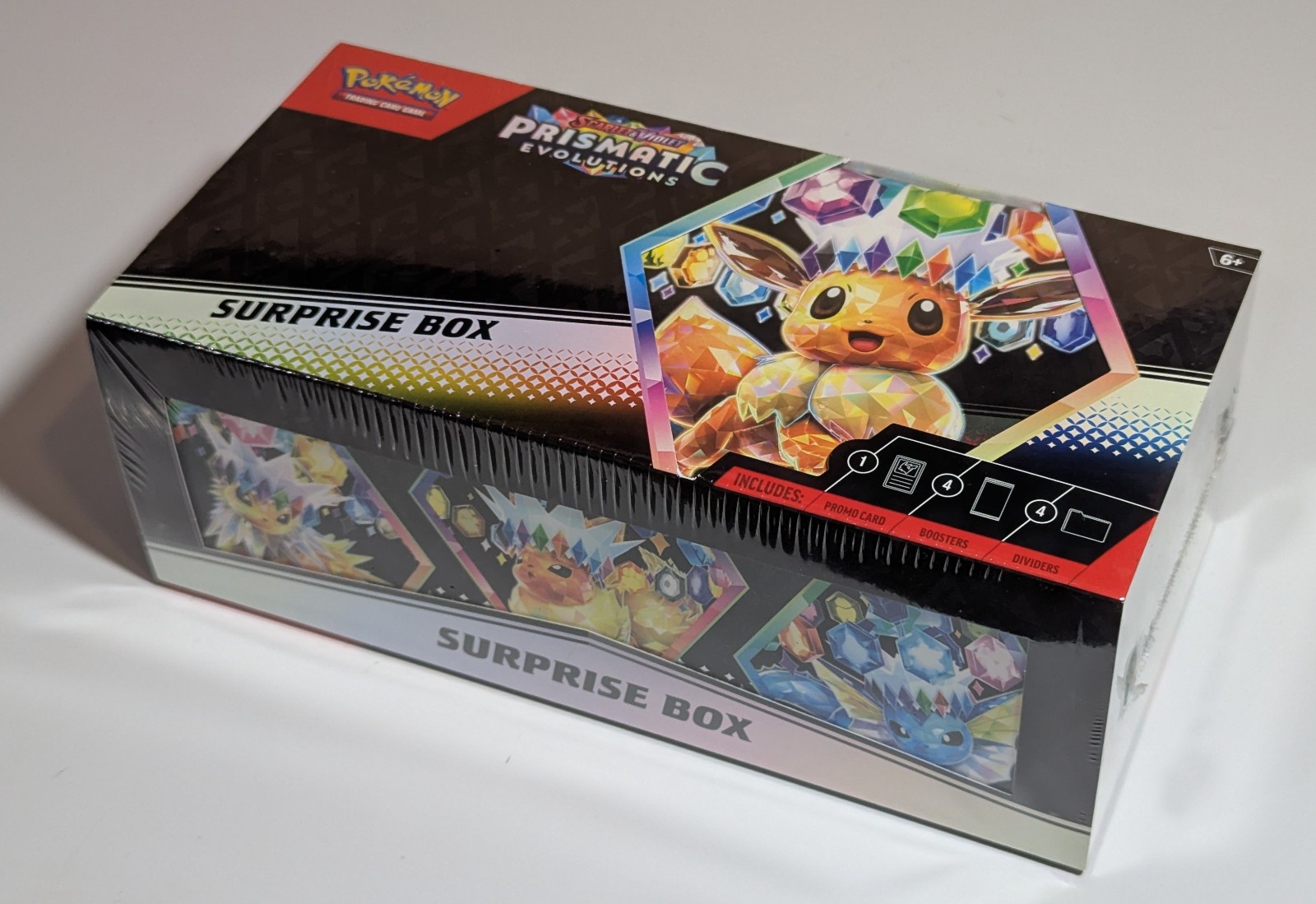 Pokemon Prismatic Evolutions - Surprise Box 4 Booster Packs New