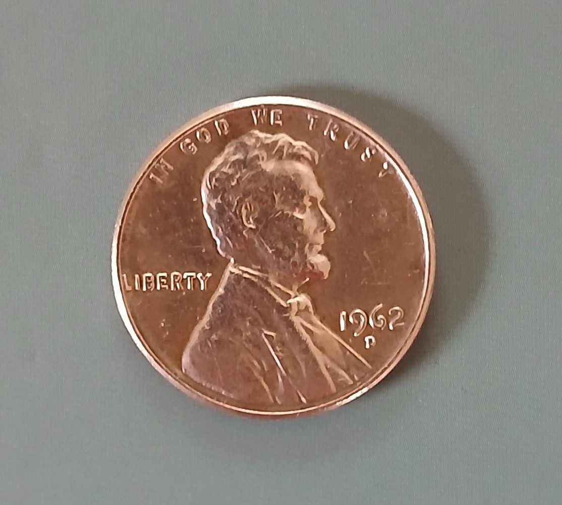 1962 Lincoln Penny with Error No1 on Top Rim L in Liberty, and IN GOD WE TRUST .