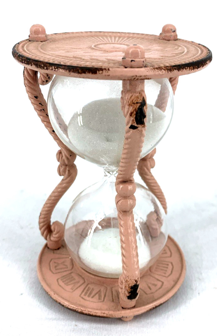 Anthropologie Sand Hourglass Metal Painted Pink Embossed Rising Sun Motif 4.5"