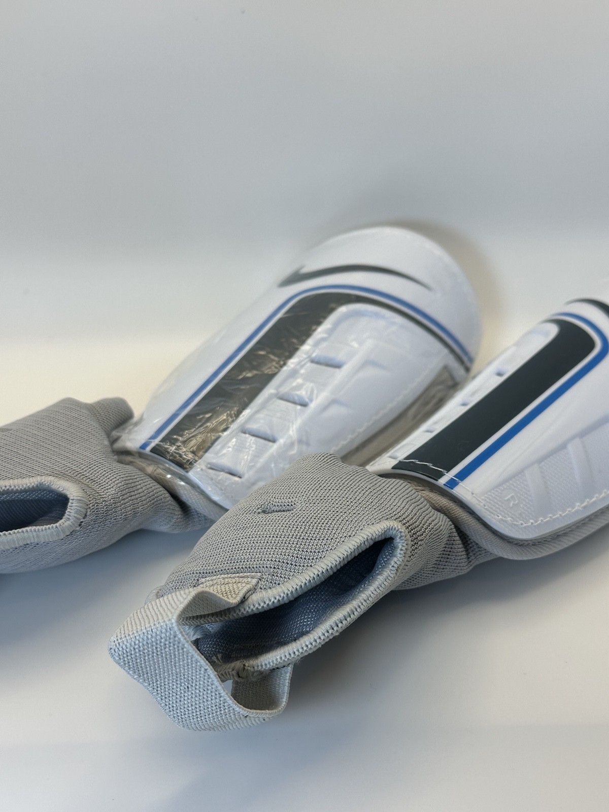 Nike Soccer Shin Guards ALL SIZES – Protective Adjustable Straps, White/Blue