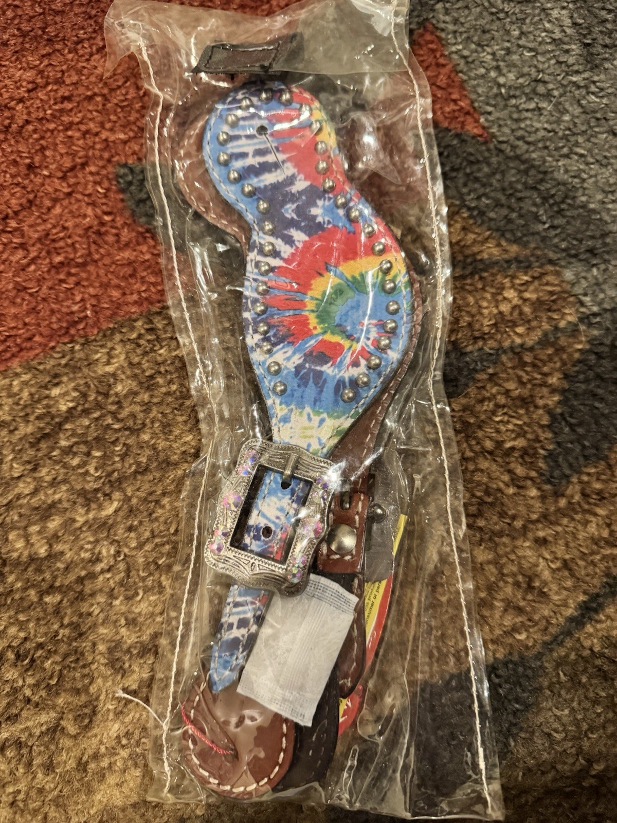 Showman Women’s Tie-Dye Studded spur strap set. Never used. In original package.