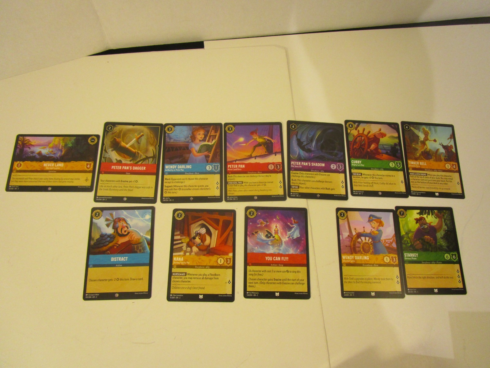 2024 Disney Lorcana  LOT OF 11   Into The Inlands Peter Pan Never Land Hero++