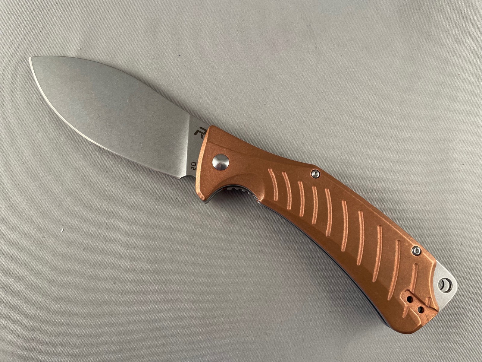 REVO Ness Liner Lock Flipper Knife Copper handles 3.3" Stonewash D2