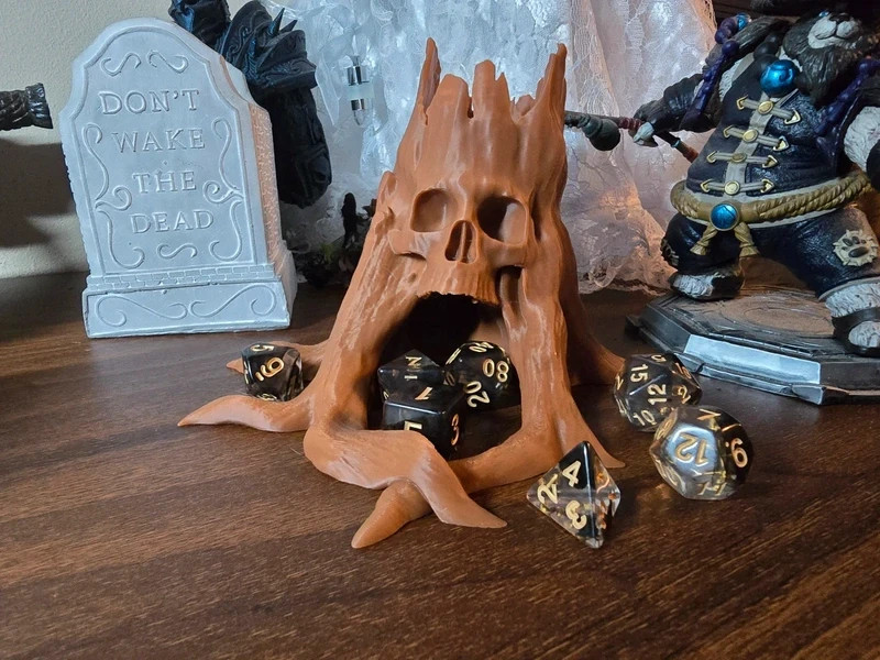 A Deathly skull tree stump novelty dice tower D&D