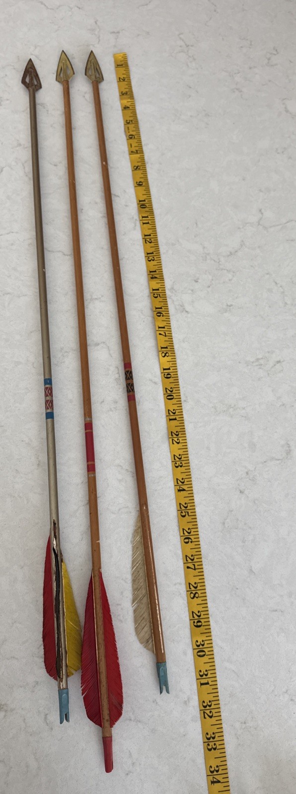 One Marked Bear.  Two Unmarked  arrows broadheads. Estate Find