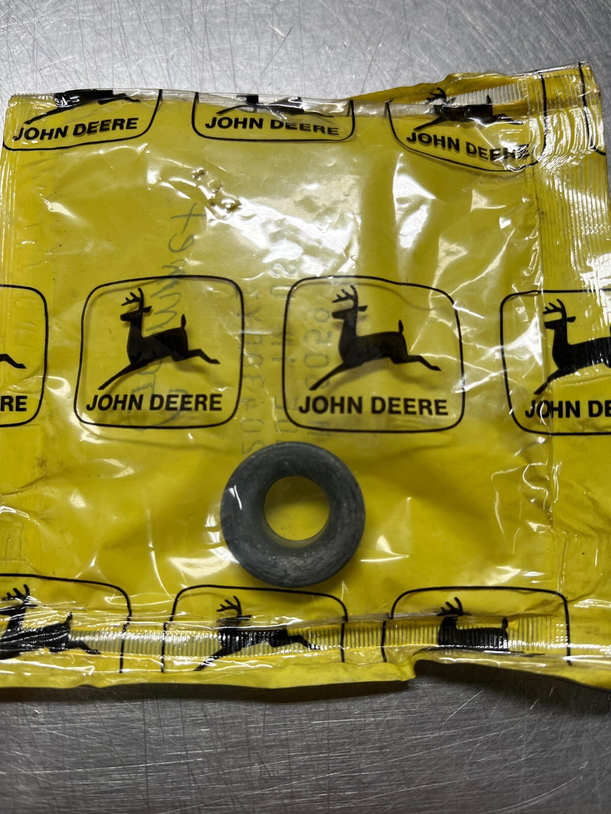 M86059  GENUINE OEM  John Deere   GROMMET