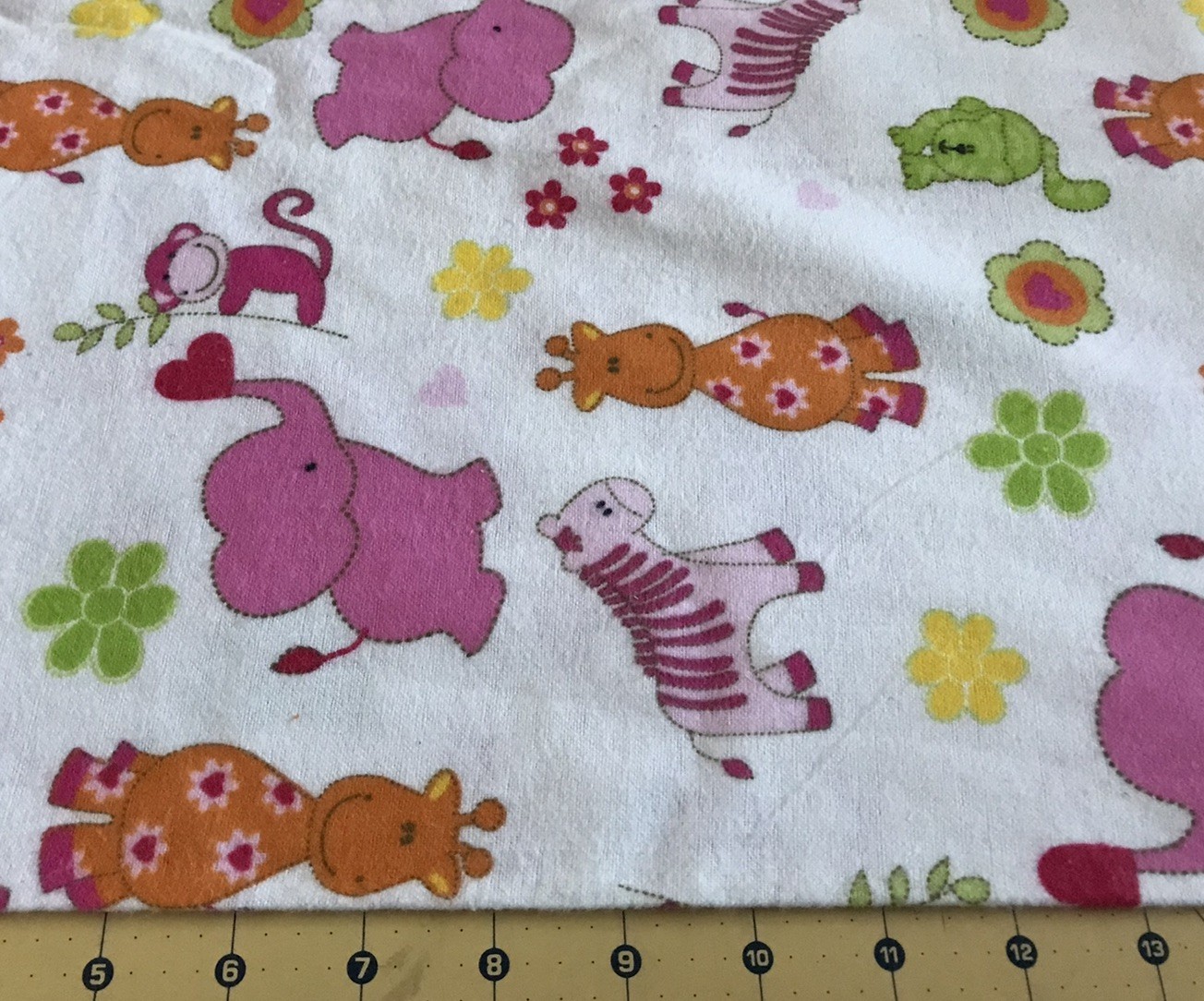 Zoo Animals Flowers Pink on White Flannel fabric sold by the yard #2410