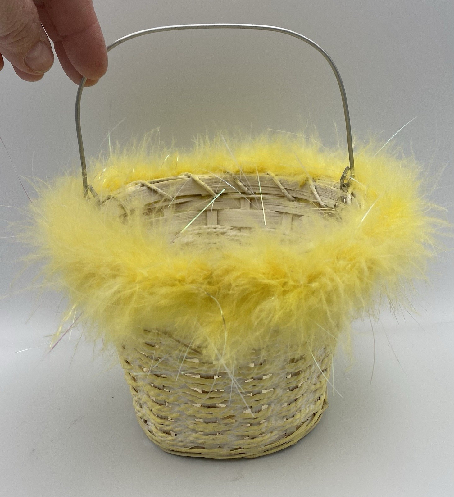 Woven Wicker Yellow Easter Basket With Fluffy Yellow Feather Trim Wire Handle